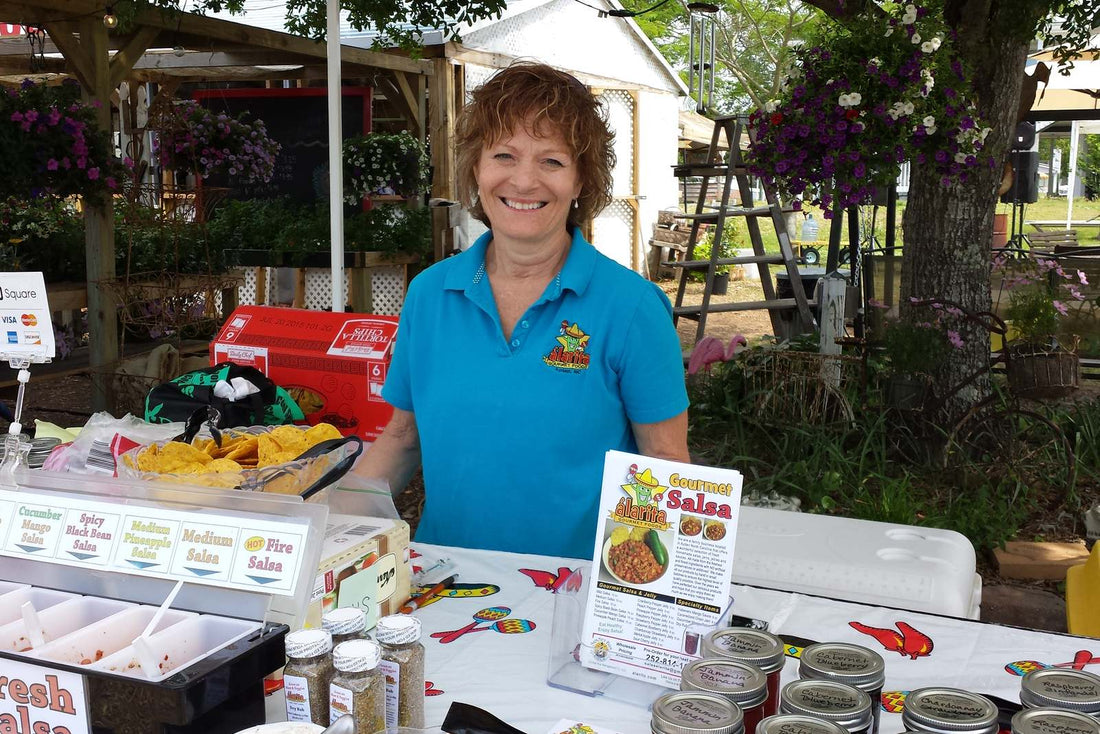 La Rita with fresh álarita salsa samples at the Pitt County farmers market